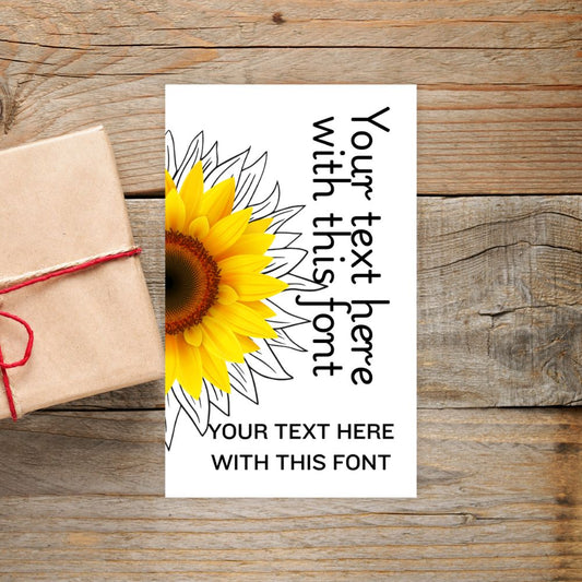 Sunflower design with text placeholder on a wooden surface. SUNFLOWER PERSONALISED GIFT TAG