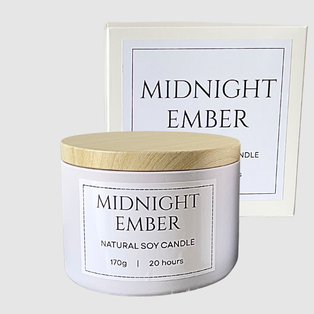 Candle labeled 'Midnight Ember' with a wooden lid on a white background. Sauvage Inspired soy candle.png