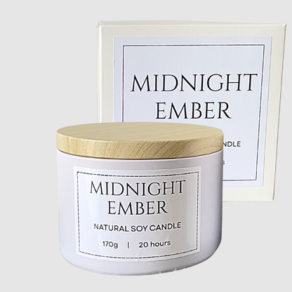 Candle labeled 'Midnight Ember' with a wooden lid on a white background. Sauvage Inspired soy candle.png