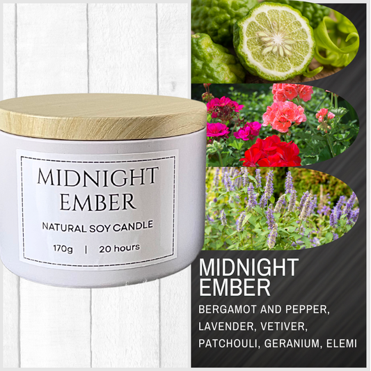 Candle labeled 'Midnight Ember' with natural ingredients and floral background. Sauvage Inspired soy candle.png