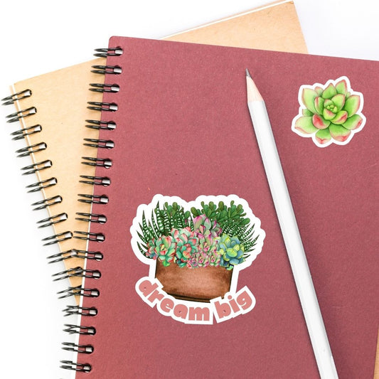 Notebook with succulent design and 'dream big' text, accompanied by a white pencil and sticker.Succulent Plants Sticker