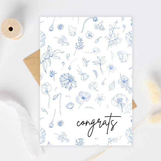 Greeting card with floral pattern and 'congrats' text on a white background. Tiny Blue Flowers Congratulations Card