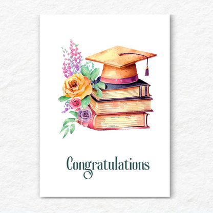 Graduation-themed card with a mortarboard, books, and flowers on a white background. VintaVintage Books Congratulations Graduation Card