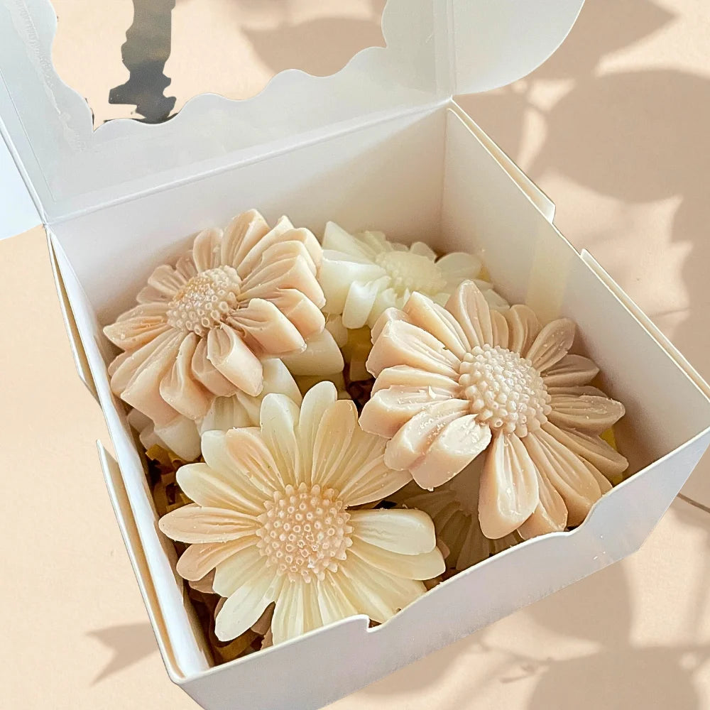 Decorative soap flowers in a white box on a beige background. DAISY FRAGRANCED WAX MELTS BOX