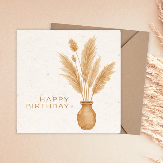 Birthday card with pampas grass and 'Happy Birthday' text on a beige background. BOHO FLOWER VASE BIRTHDAY CARD 