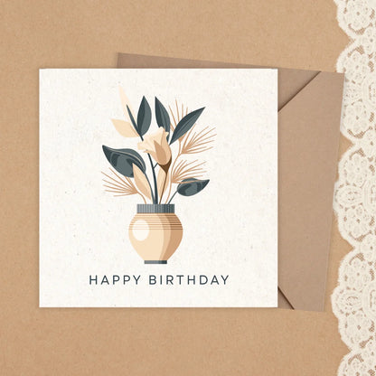 Birthday card with floral design and 'Happy Birthday' text on a brown background. BOHO FLOWERS BIRTHDAY CARD 