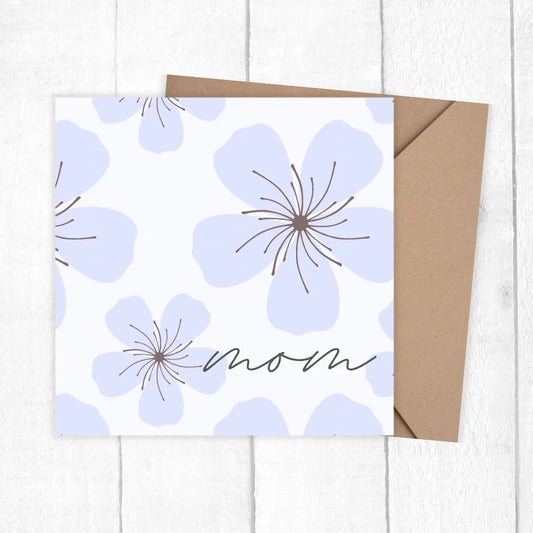 Greeting card with purple flowers and 'mom' text on a white background. PURPLE FLOWERS MOTHER'S DAY CARD