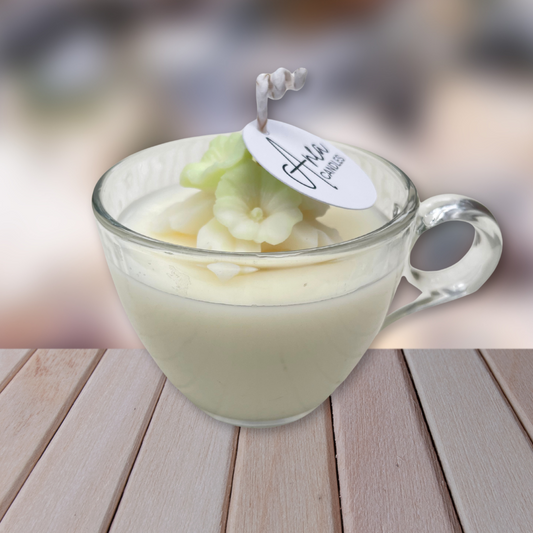 Glass mug with a green dessert on a wooden surface. sandalwood  candy floss candle