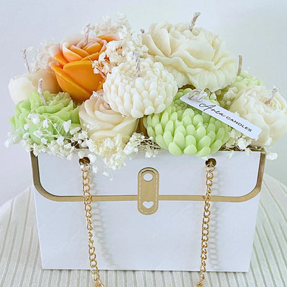 Assorted colorful candles in a decorative box with a visible brand tag.SUMMER CANDLE FLOWER BOUQUET BAG